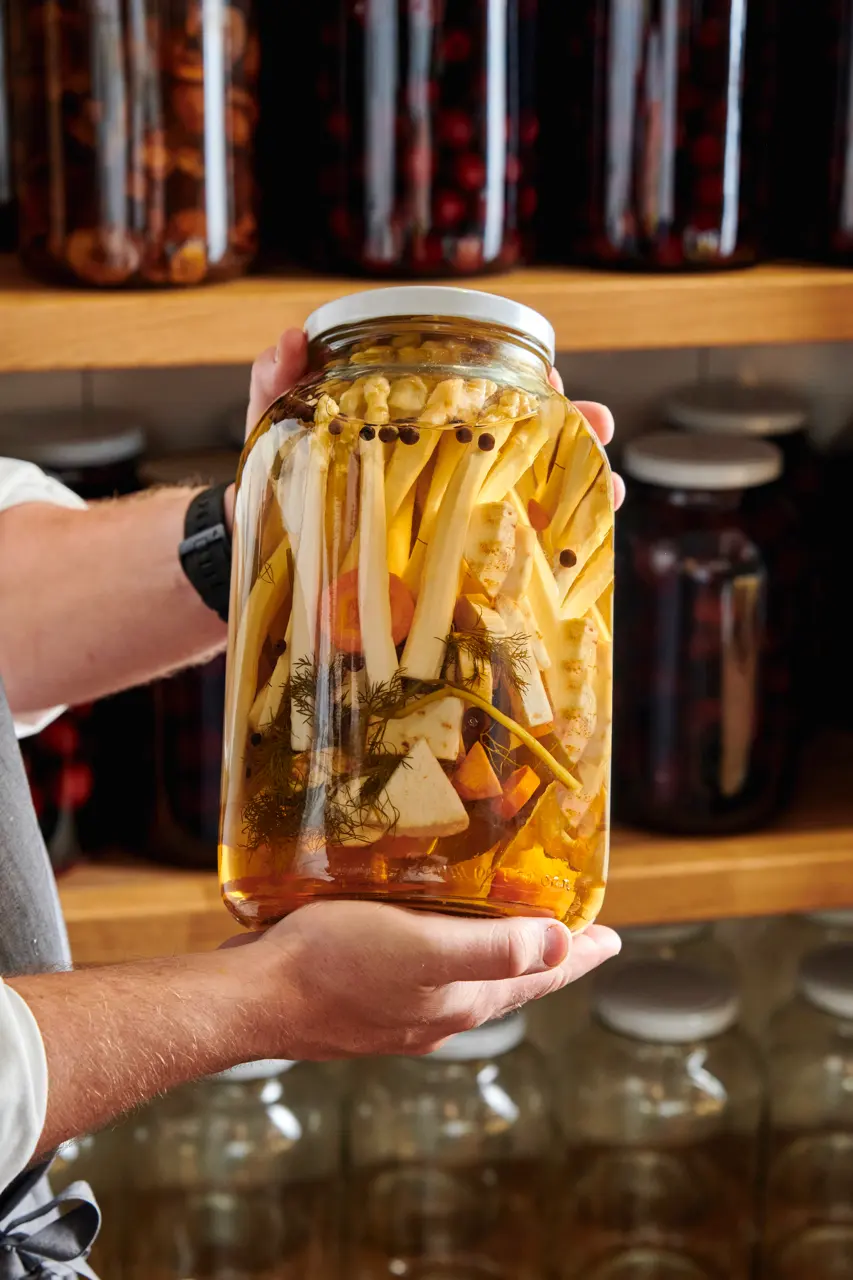 Homemade pickled vegetables in a jar.